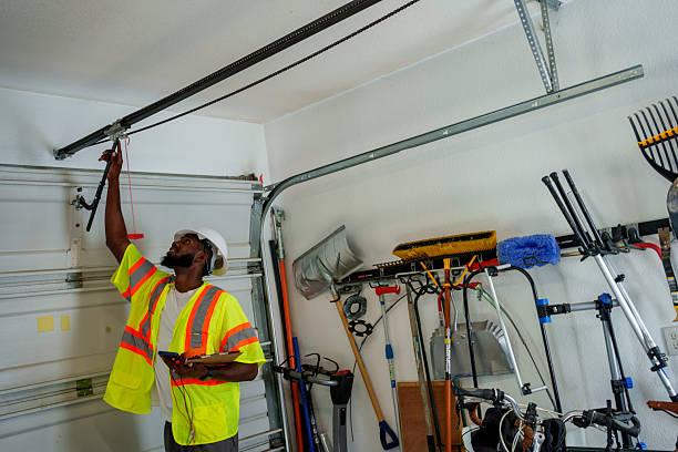 Professional Garage Door Panel Replacement technician working in Forest City, PA